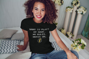 Smiling girl wearing Want to Play. My Game, My Rules, Moxie On t shirt. Moxie Chic is a brand encouraging all girls to #VoiceYourMoxie. Moxie Chic provides positive messaging for girls, celebrating and elevating girls to empower girls.  
